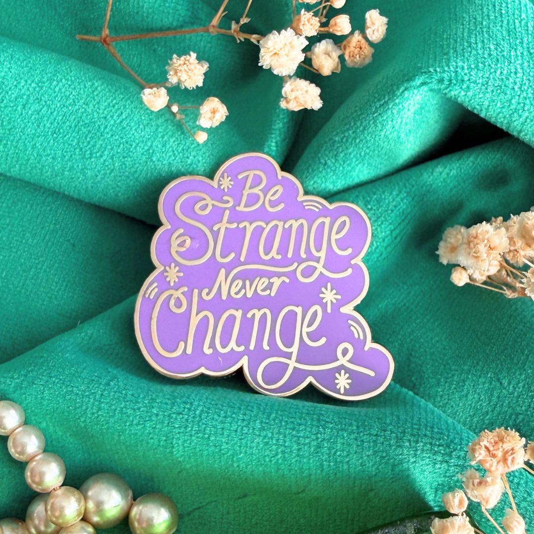 Be Strange Never Change Lapel Pin
