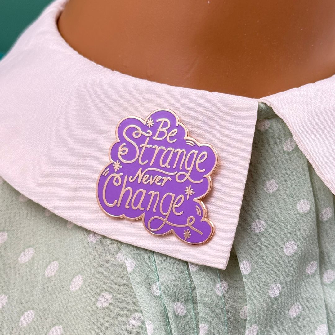 Be Strange Never Change Lapel Pin