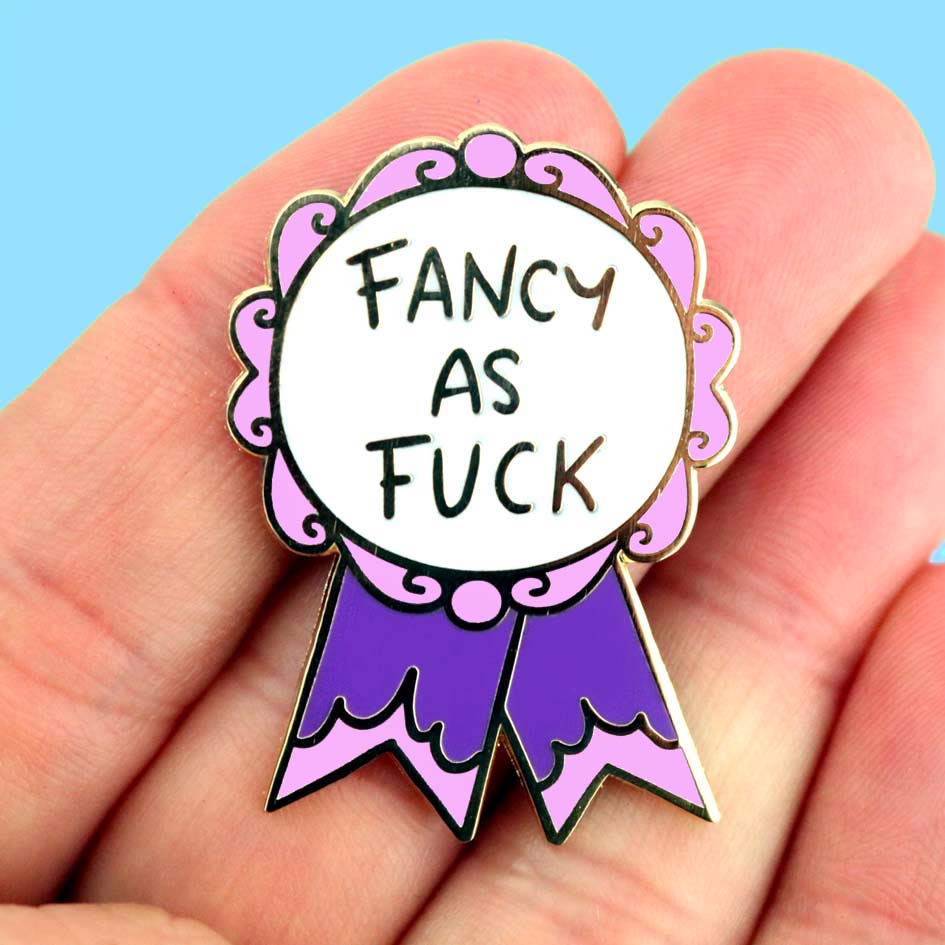 Fancy As Fuck Lapel Pin held in hand