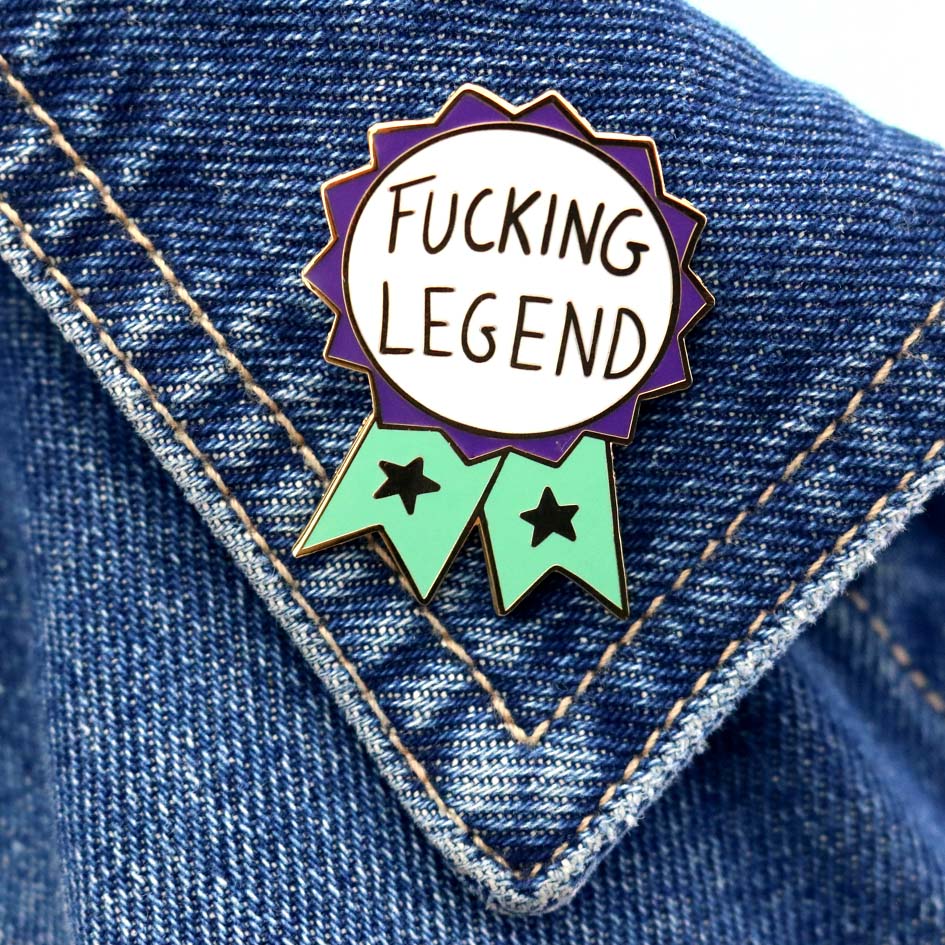 Fucking Legend Lapel Pin on a denim jacket lapel