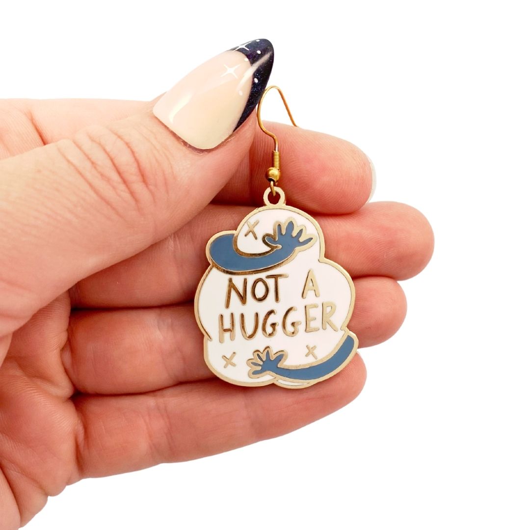 Not a Hugger earring being held