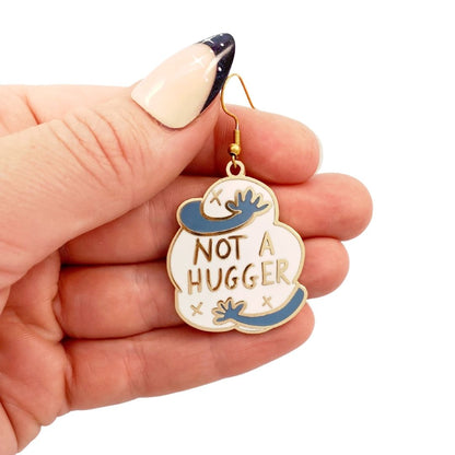 Not a Hugger earring being held