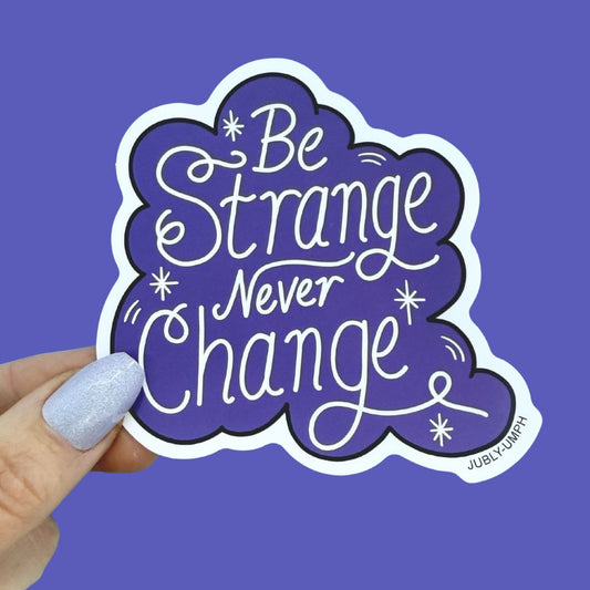 Be Strange Never Change Sticker
